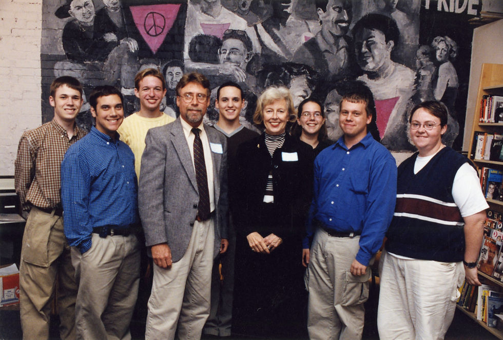 The GLO Center's board of directors, photographed in the late 1990s. The board consists of men and women of various ages.