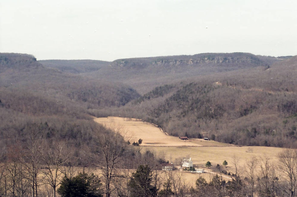 The Boxley Valley of northwest Arkansas, photographed from a high vantage point. Boxley Baptist Church is visible in the foreground.