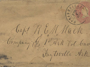 A weathered and yellowed envelope. The postmark reads "Springfield." Writing on envelope reads "Capt R. E. M. Mack, Company G, 1st Ark Vol Cav, Fayettevile Ark"