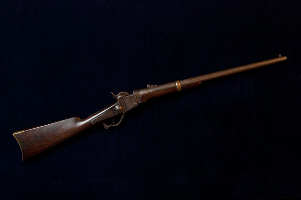 A Starr .54 caliber carbine photographed against a black backdrop.