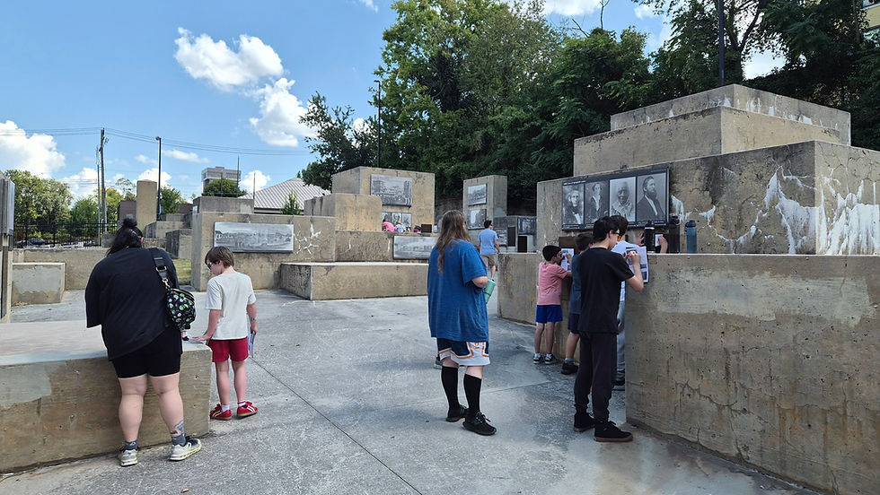 Attendees of the Young Historians Club complete a scavenger hunt at Founders Park in Downtown Springfield.
