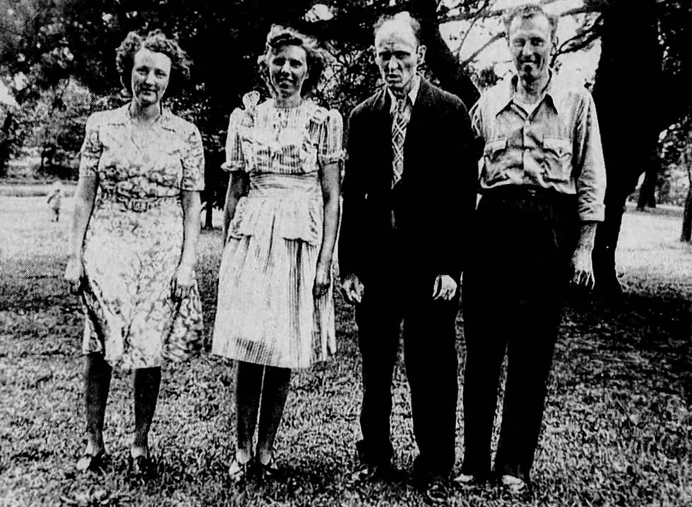 Black and white photograph of members of the Deeds family on the grounds of State Hospital No. 3 in Nevada, Missouri. From left: Dot Engelage, Helen "Tootsie" Gimlin, James Edward Deeds, Jr., and Clay Deeds.