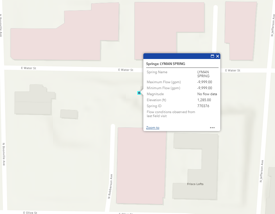 A green dot on a map of E Water St showing Lyman Spring