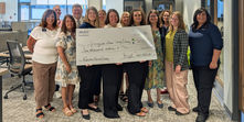  Arvest Bank and Library Employees display check