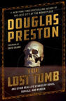 Book cover: "The Lost Tomb" by Douglas Preston, featuring a skull on a dark background with bold gold text and a mysterious, eerie tone.